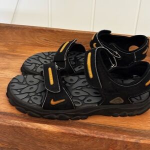 Adult ACG Men’s Black and Gold Nike Sandals